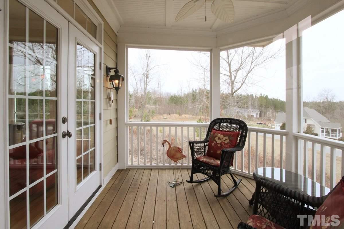 58 Lookout Ridge Pittsboro, NC 27312 - Photo 19 of 25 Screened porch with impressive views and beautiful sunsets.