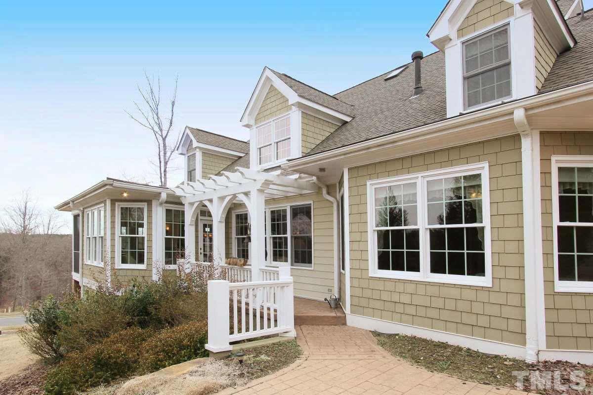 58 Lookout Ridge Pittsboro, NC 27312 - Photo 21 of 25 Rear view provides long range views, beautiful sunsets and areas to relax on the custom patio.