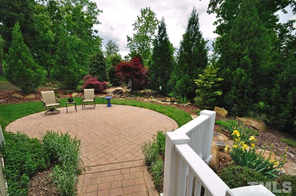 58 Lookout Ridge Pittsboro, NC 27312 - Photo 24 of 25 Relax on the back patio overlooking the pond - wonderful space for entertaining