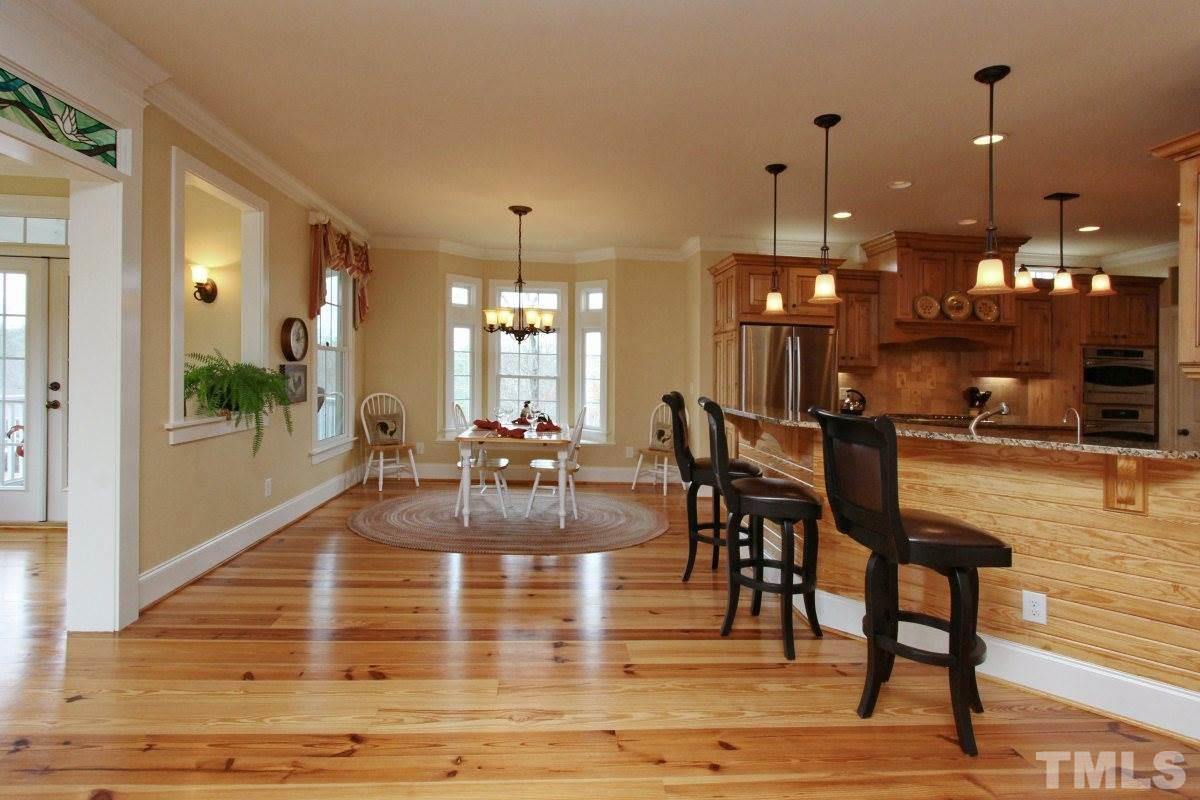 58 Lookout Ridge Pittsboro, NC 27312 - Photo 5 of 25 Breakfast nook is large enough to accommodate a big harvest table and 8 chairs!