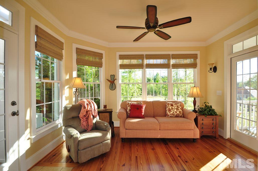 58 Lookout Ridge Pittsboro, NC 27312 - Photo 9 of 25 Cozy sunroom is perfect for relaxing with your morning coffee!