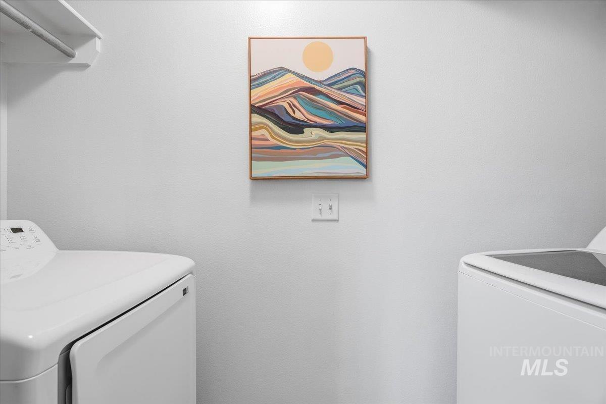679 North Shadowfox Place Eagle, ID 83616 - Photo 23 of 28 Washroom featuring washing machine and dryer