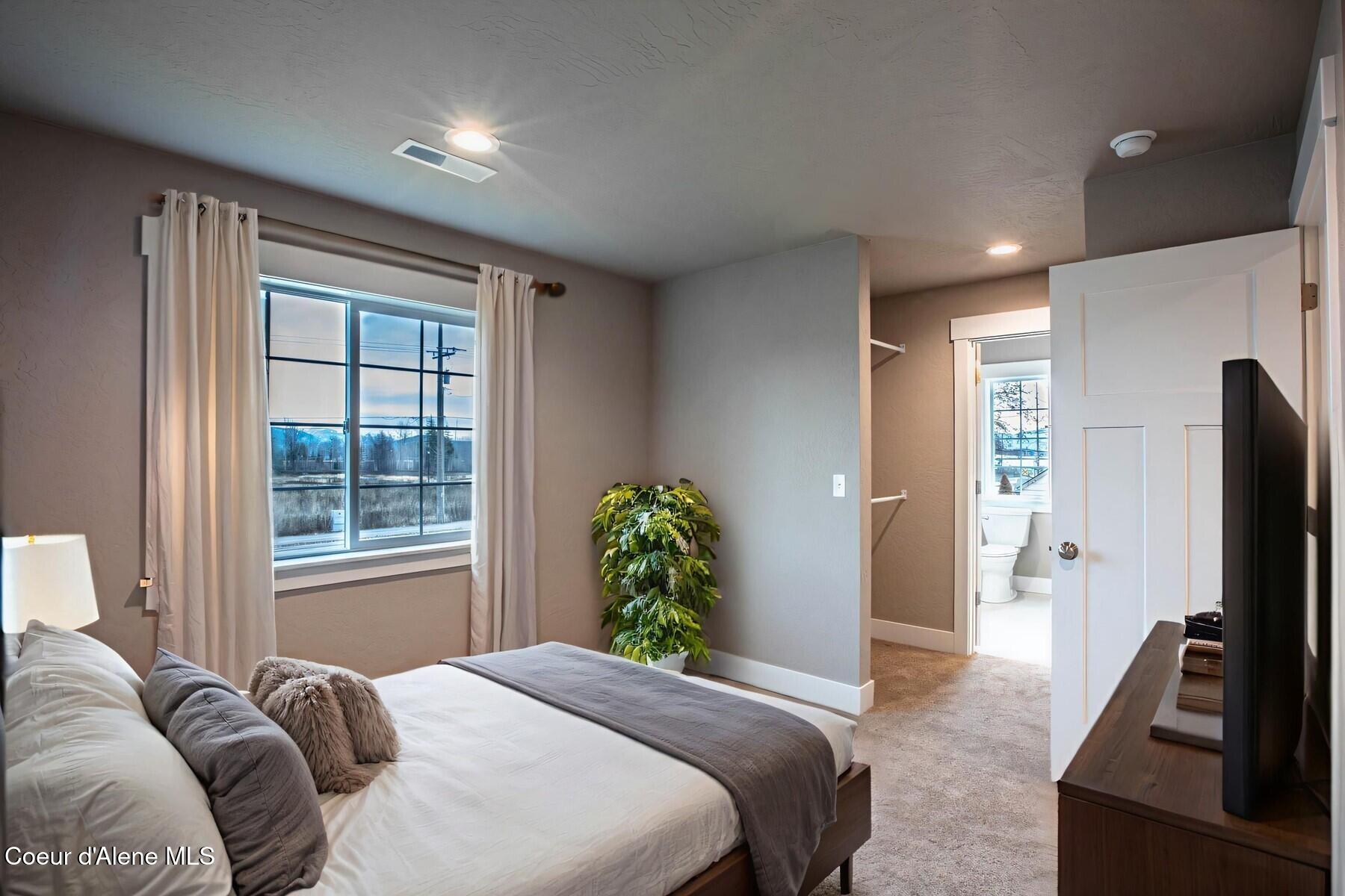 1650 Irvine Way Sandpoint, ID 83864 - Photo 12 of 34 Master opens to closet and bath