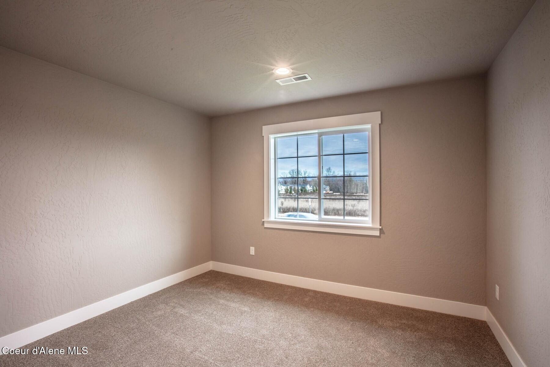 1650 Irvine Way Sandpoint, ID 83864 - Photo 14 of 34 Master Bedroom