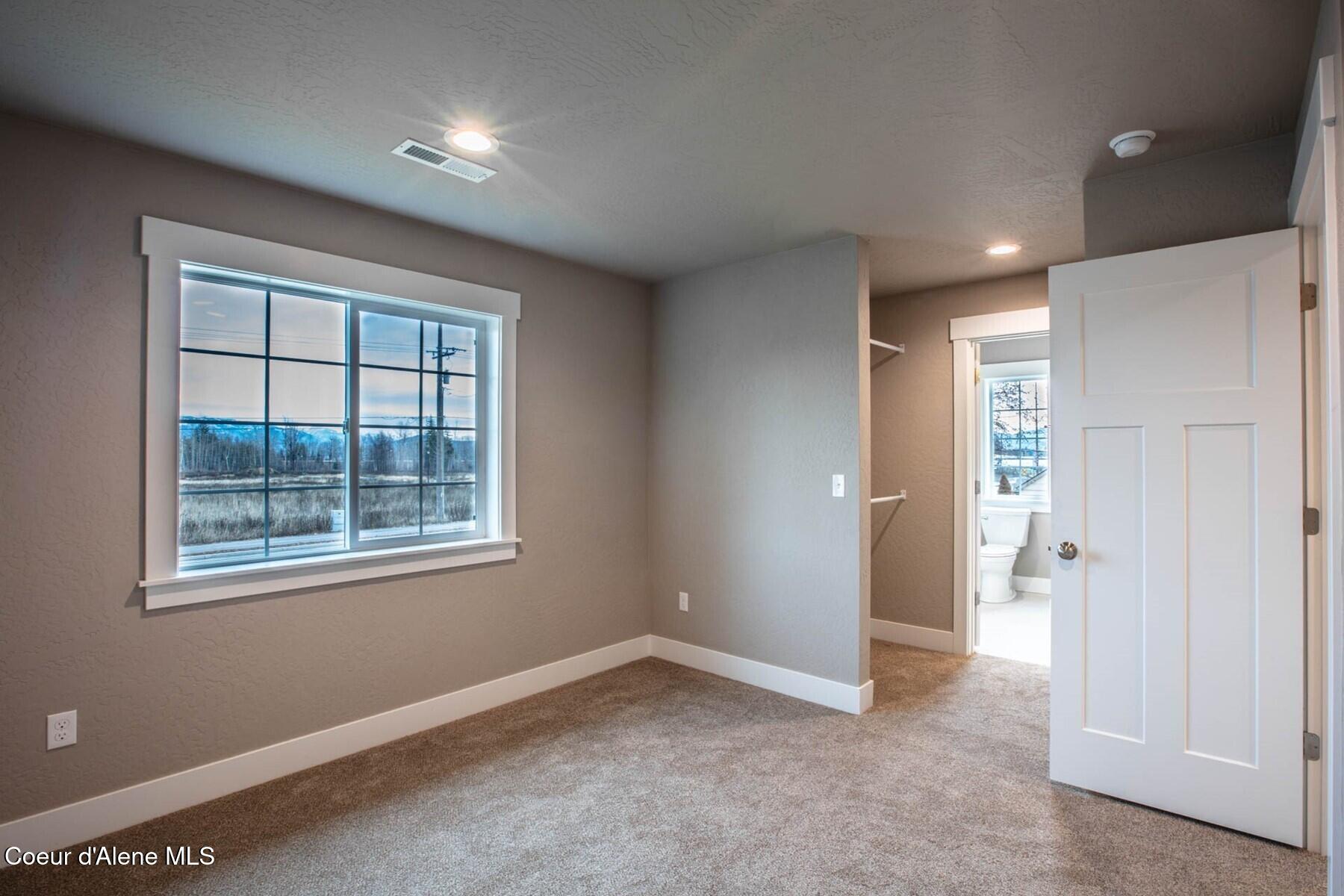 1650 Irvine Way Sandpoint, ID 83864 - Photo 9 of 34 Master Bedroom