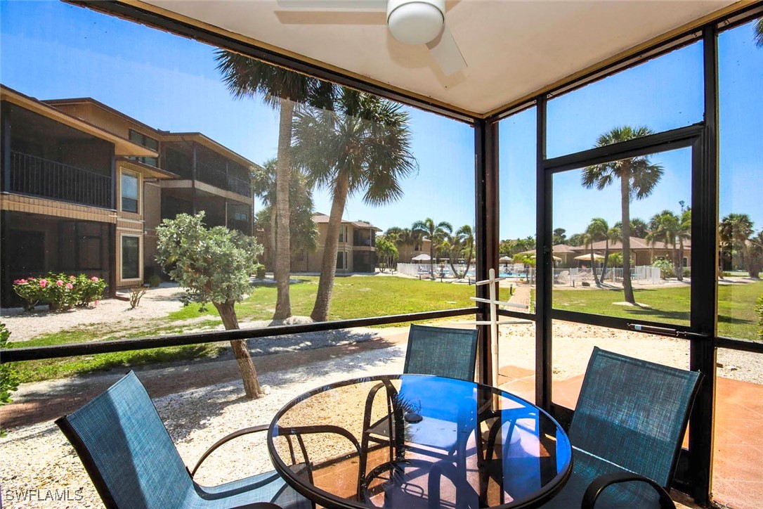 a view of a swimming pool with a patio