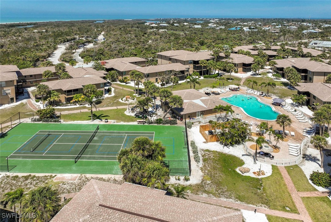 5117 Sea Bell Road, Unit B101 Sanibel, FL 33957 - Photo 19 of 23 an aerial view of residential houses with outdoor space