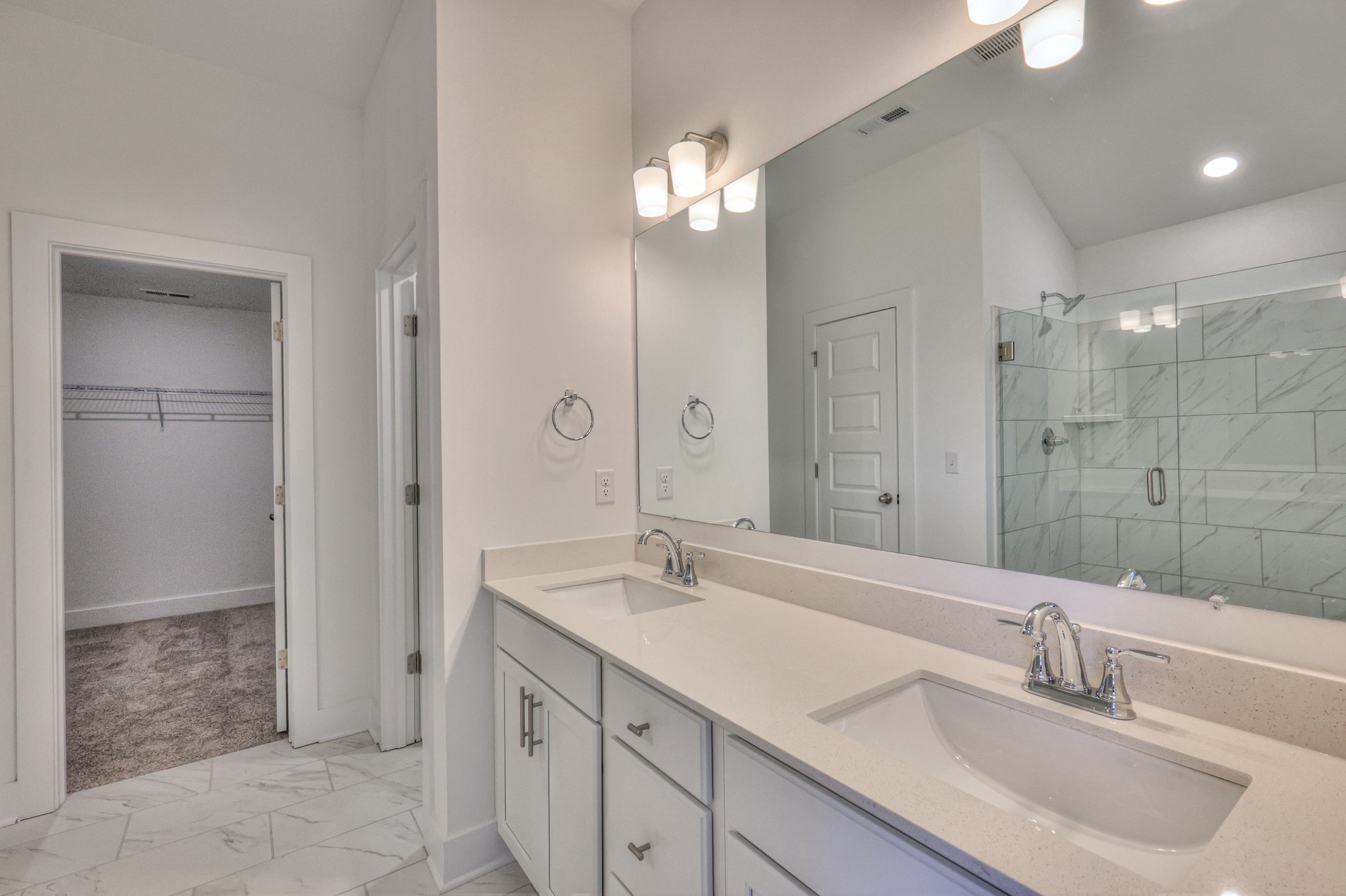 423 Duchess Boulevard Gallatin, TN 37066 - Photo 29 of 41 a bathroom with a sink double vanity and a shower