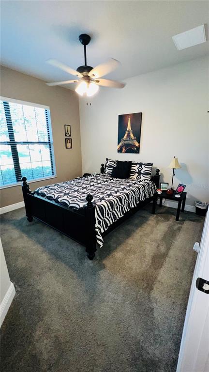 1597 West Caroline Path Lecanto, FL 34461 - Photo 12 of 28 a bedroom with bed and a window