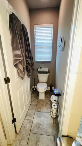 a bathroom with a toilet and a sink