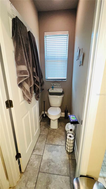 1597 West Caroline Path Lecanto, FL 34461 - Photo 20 of 28 a bathroom with a toilet and a sink