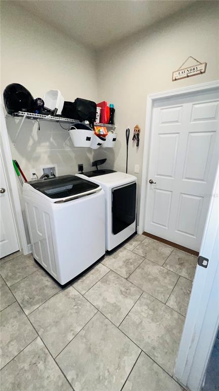 1597 West Caroline Path Lecanto, FL 34461 - Photo 24 of 28 a utility room with washer and dryer