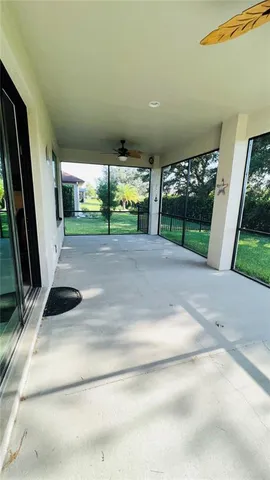 a bathroom with a sink and a large window