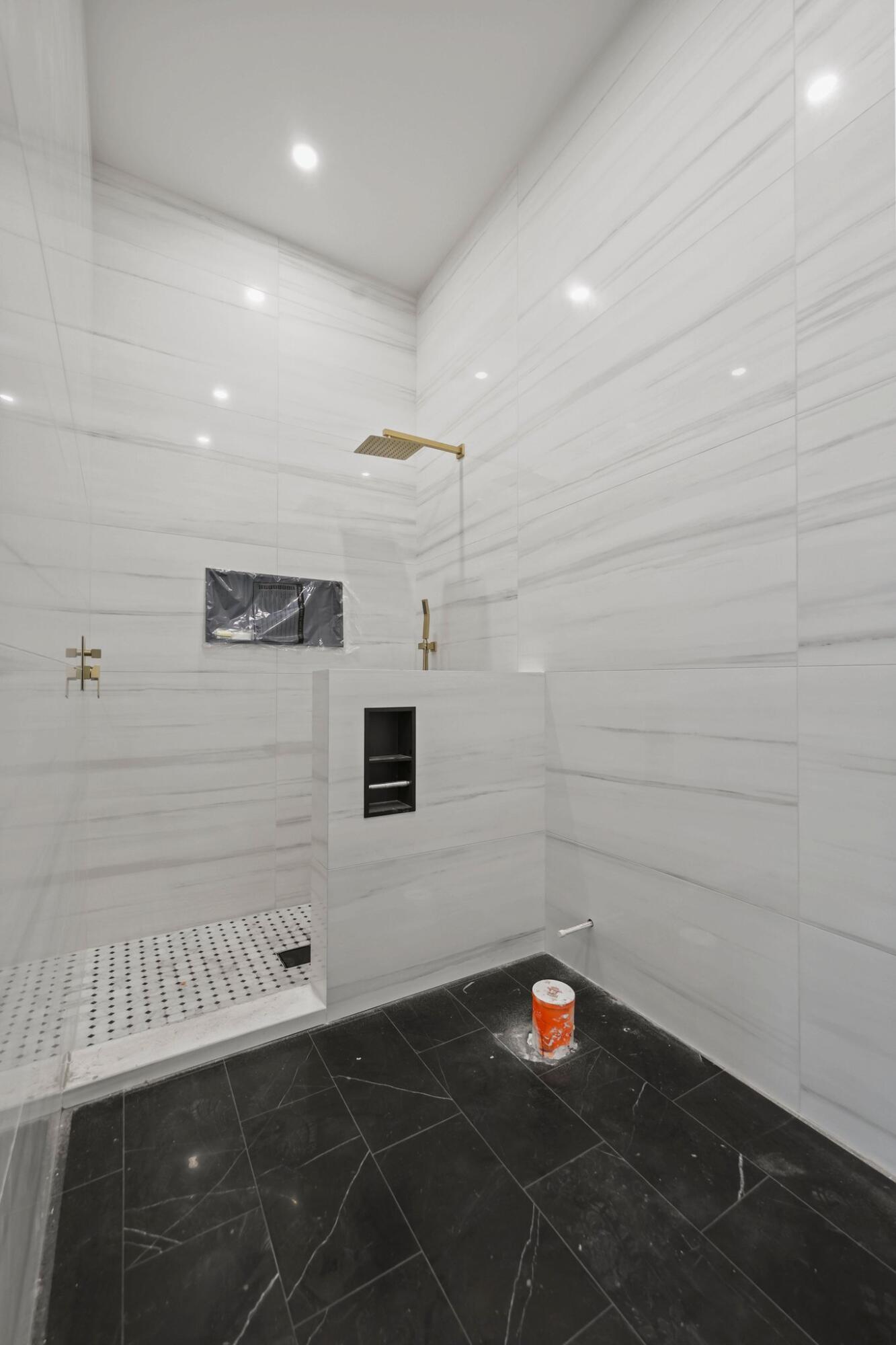 298 Northeast 8th Street Boca Raton, FL 33432 - Photo 14 of 48 a bathroom with a sink and a shower