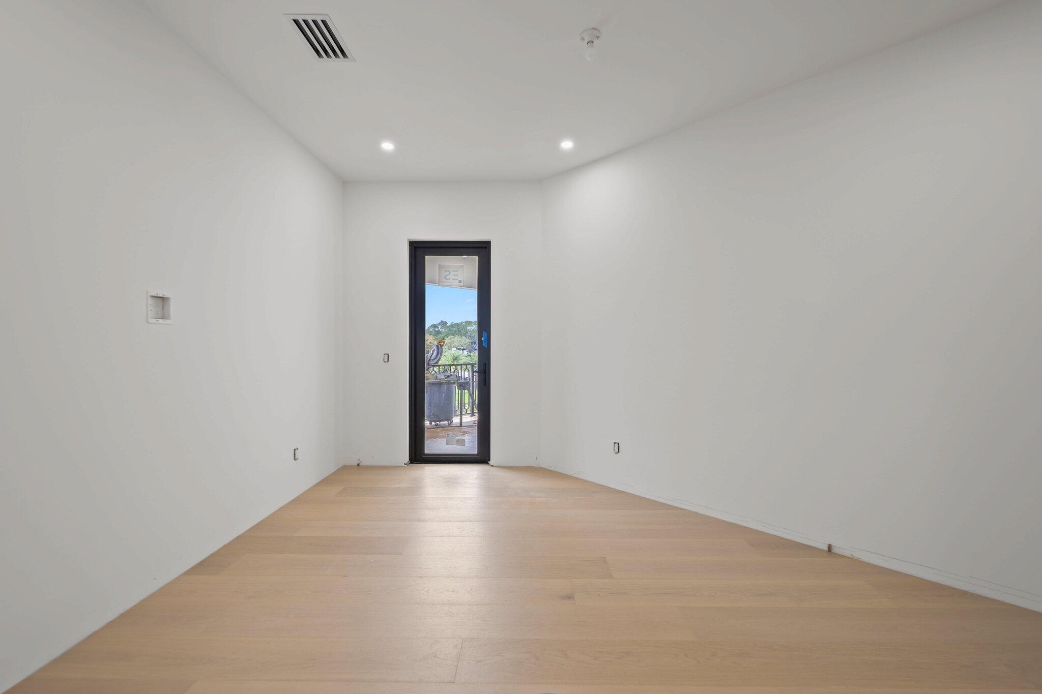 298 Northeast 8th Street Boca Raton, FL 33432 - Photo 22 of 48 a view of an empty room with a window