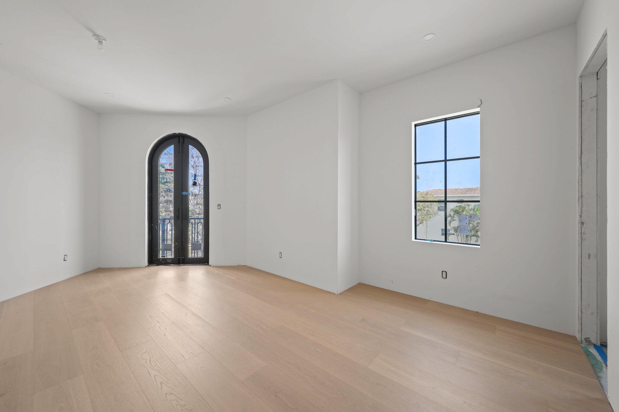 298 Northeast 8th Street Boca Raton, FL 33432 - Photo 26 of 48 an empty room with windows and closet