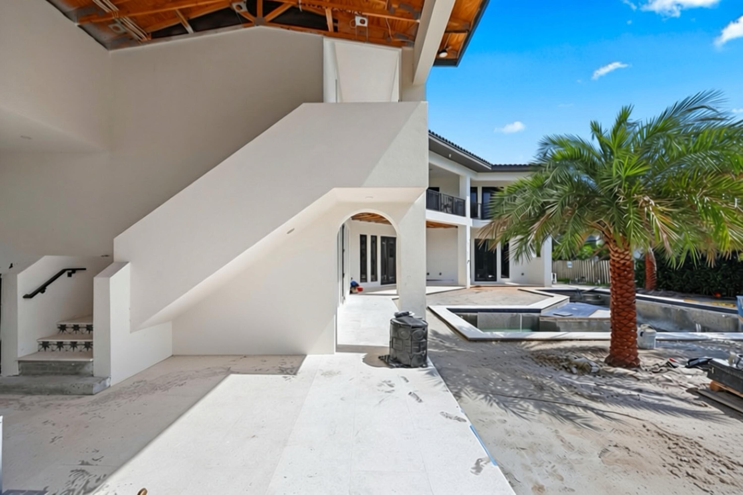 298 Northeast 8th Street Boca Raton, FL 33432 - Photo 38 of 48 a house with palm tree in front of it