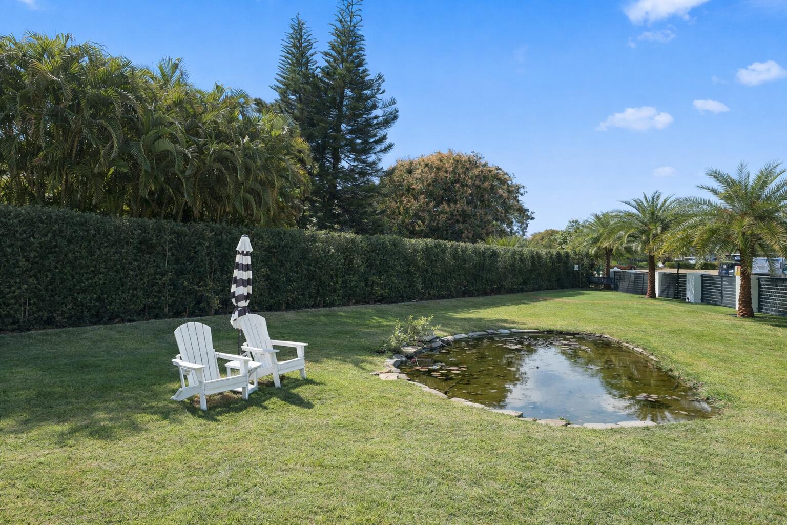 298 Northeast 8th Street Boca Raton, FL 33432 - Photo 40 of 48 Expansive side yard & pond