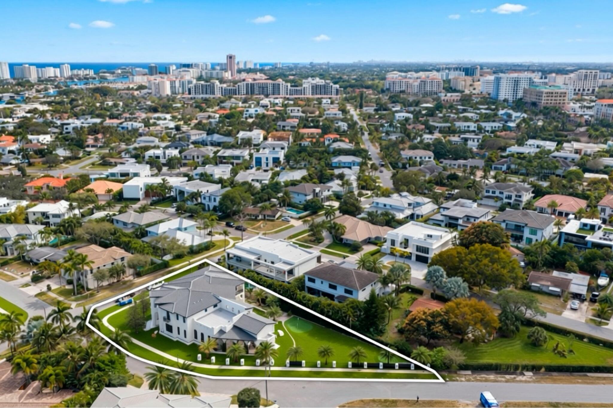 298 Northeast 8th Street Boca Raton, FL 33432 - Photo 45 of 48 an aerial view of a house with a garden and lake view