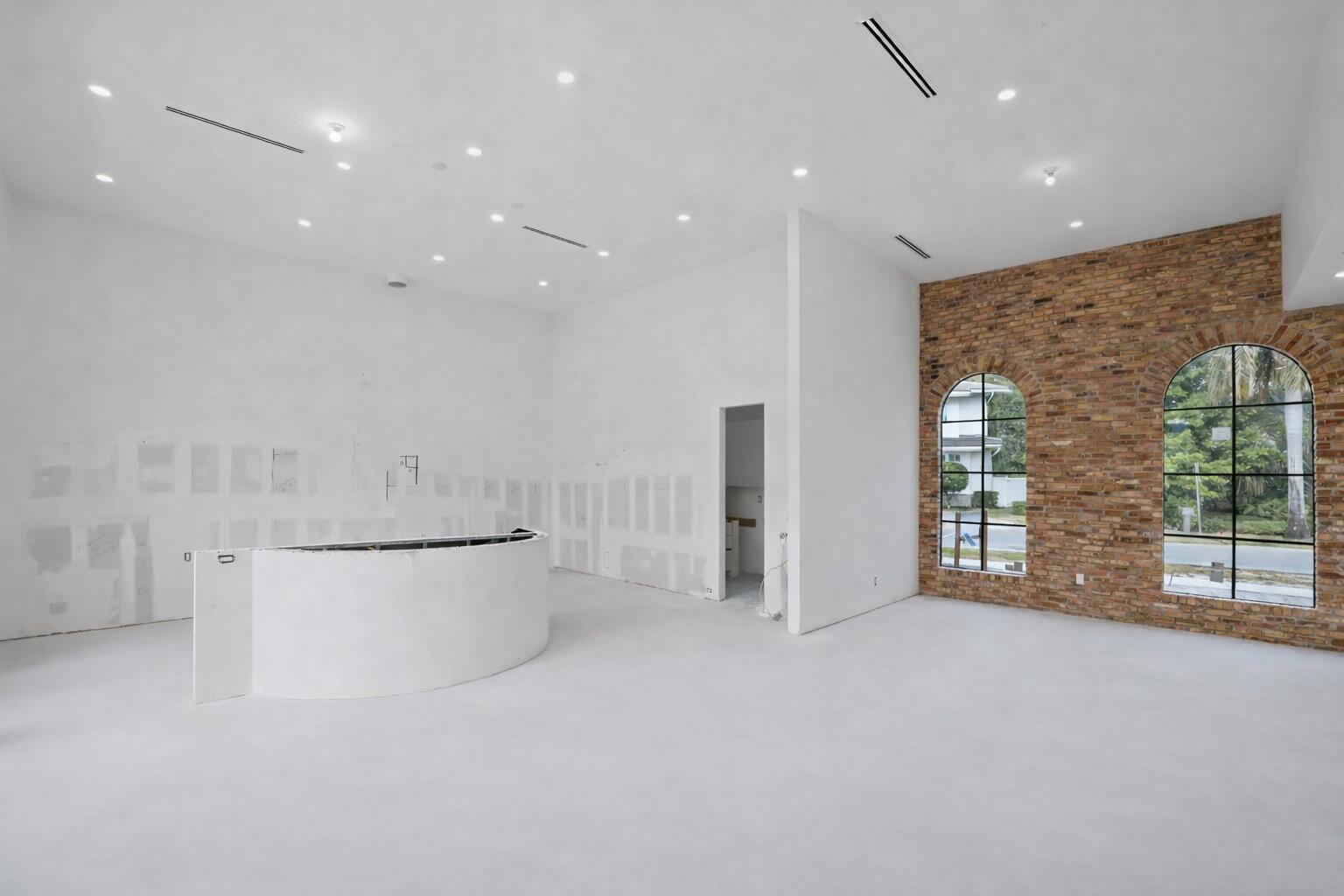 298 Northeast 8th Street Boca Raton, FL 33432 - Photo 10 of 48 a view of an empty room with a window and a living room