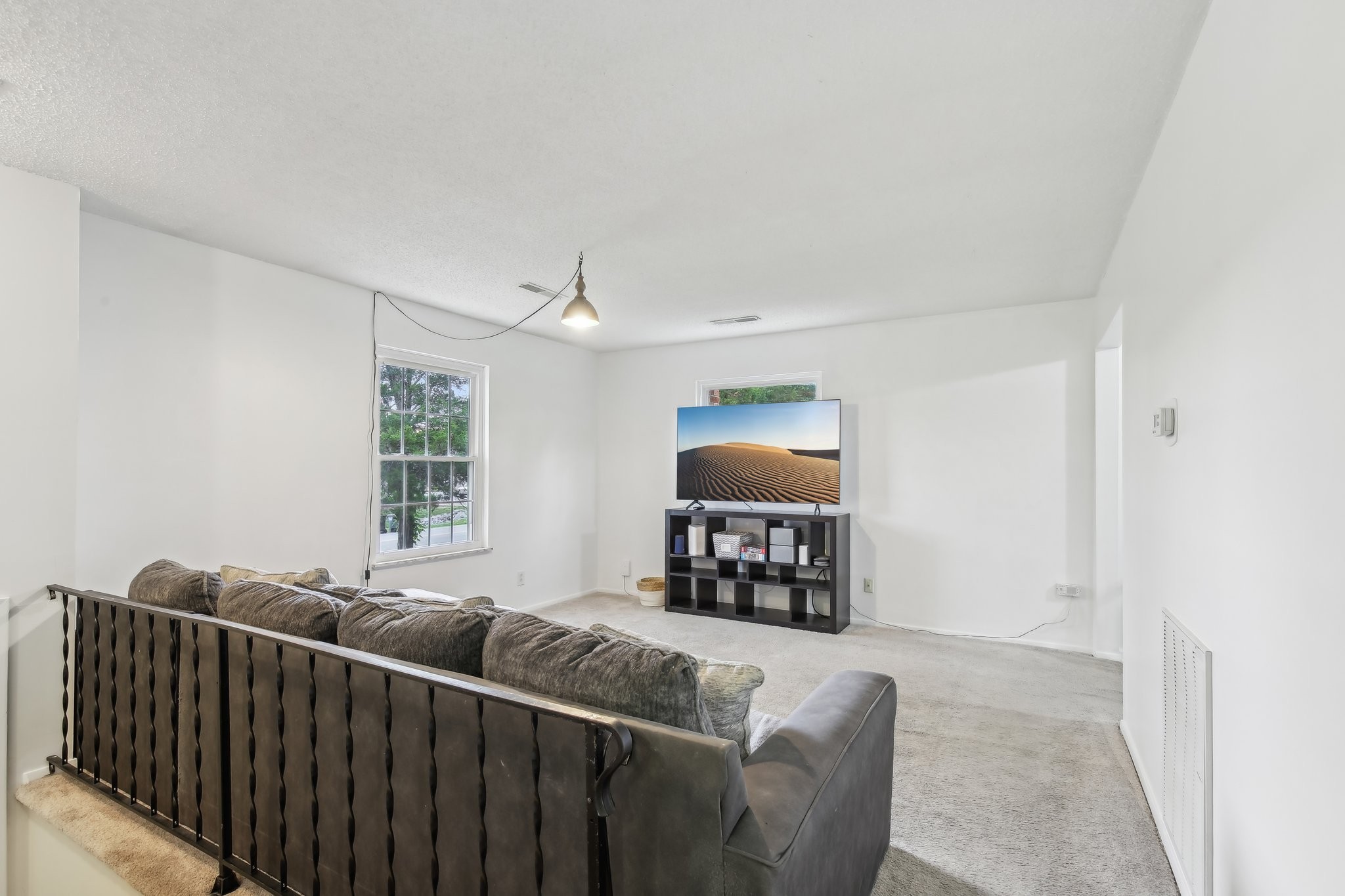 144 Airport Road Clarksville, TN 37042 - Photo 1 of 49 a living room with furniture a window and a flat screen tv