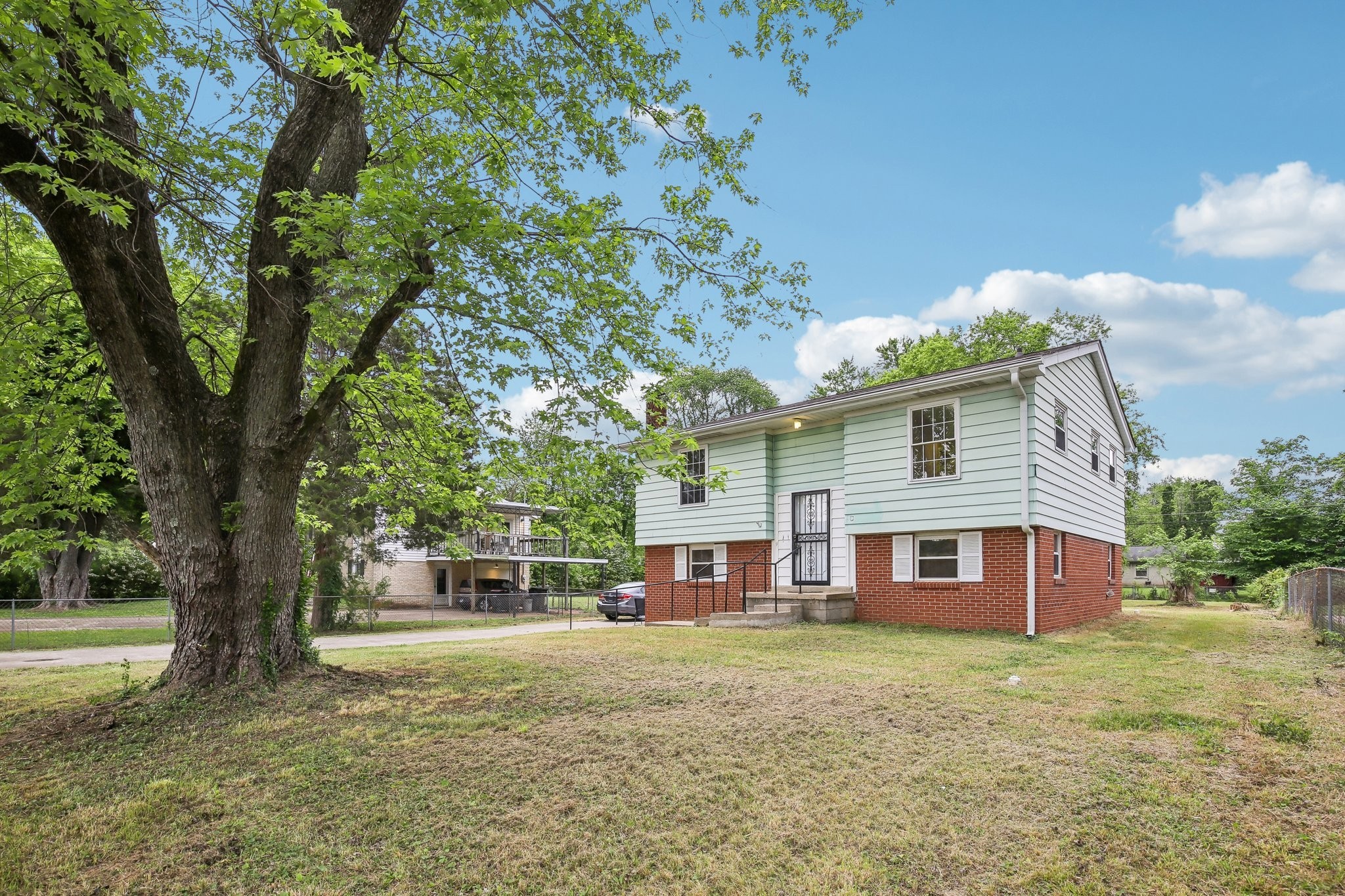 144 Airport Road Clarksville, TN 37042 - Photo 3 of 49 a view of a house with a yard
