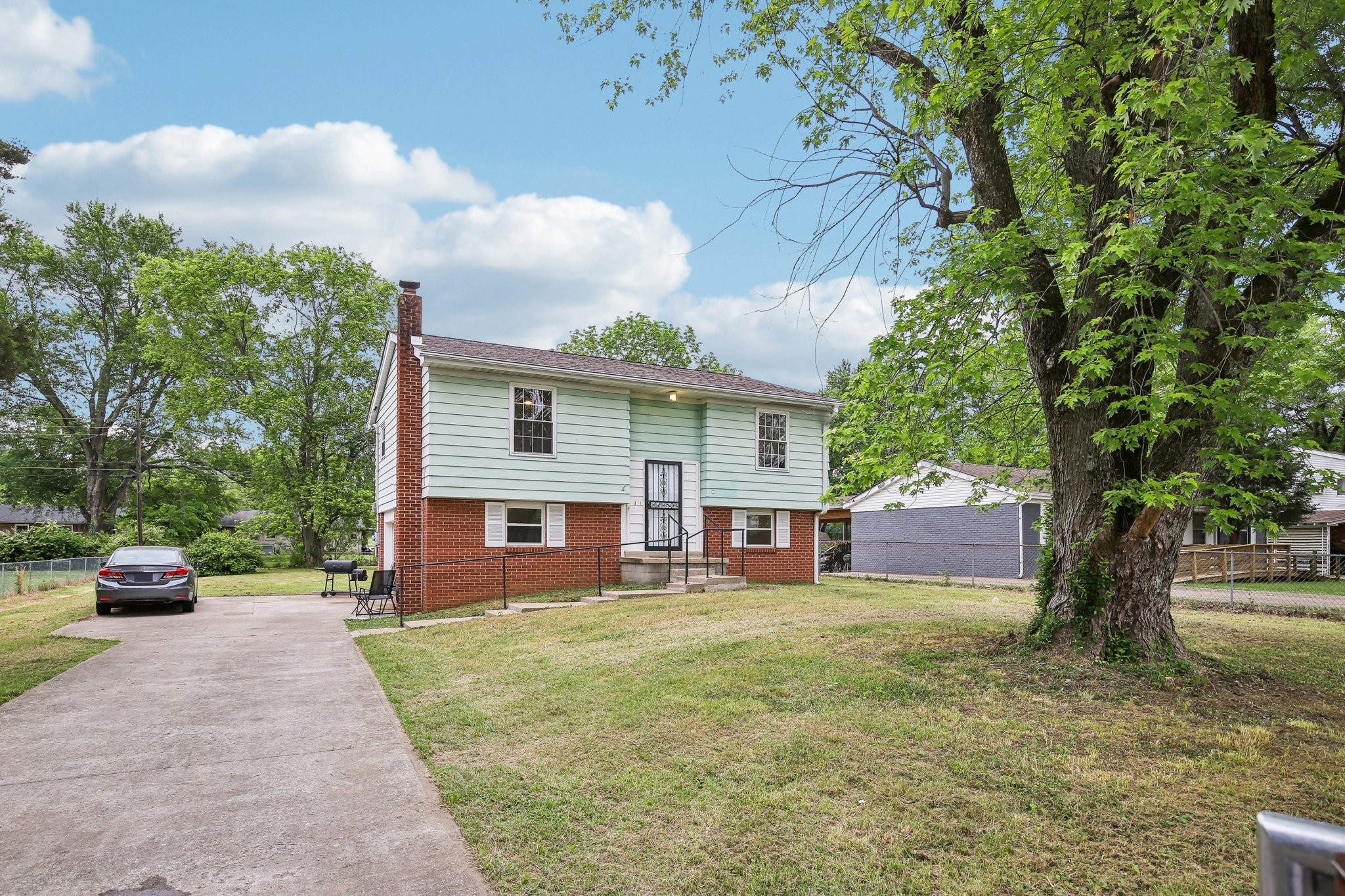 144 Airport Road Clarksville, TN 37042 - Photo 33 of 49 a view of a house with a yard and sitting area