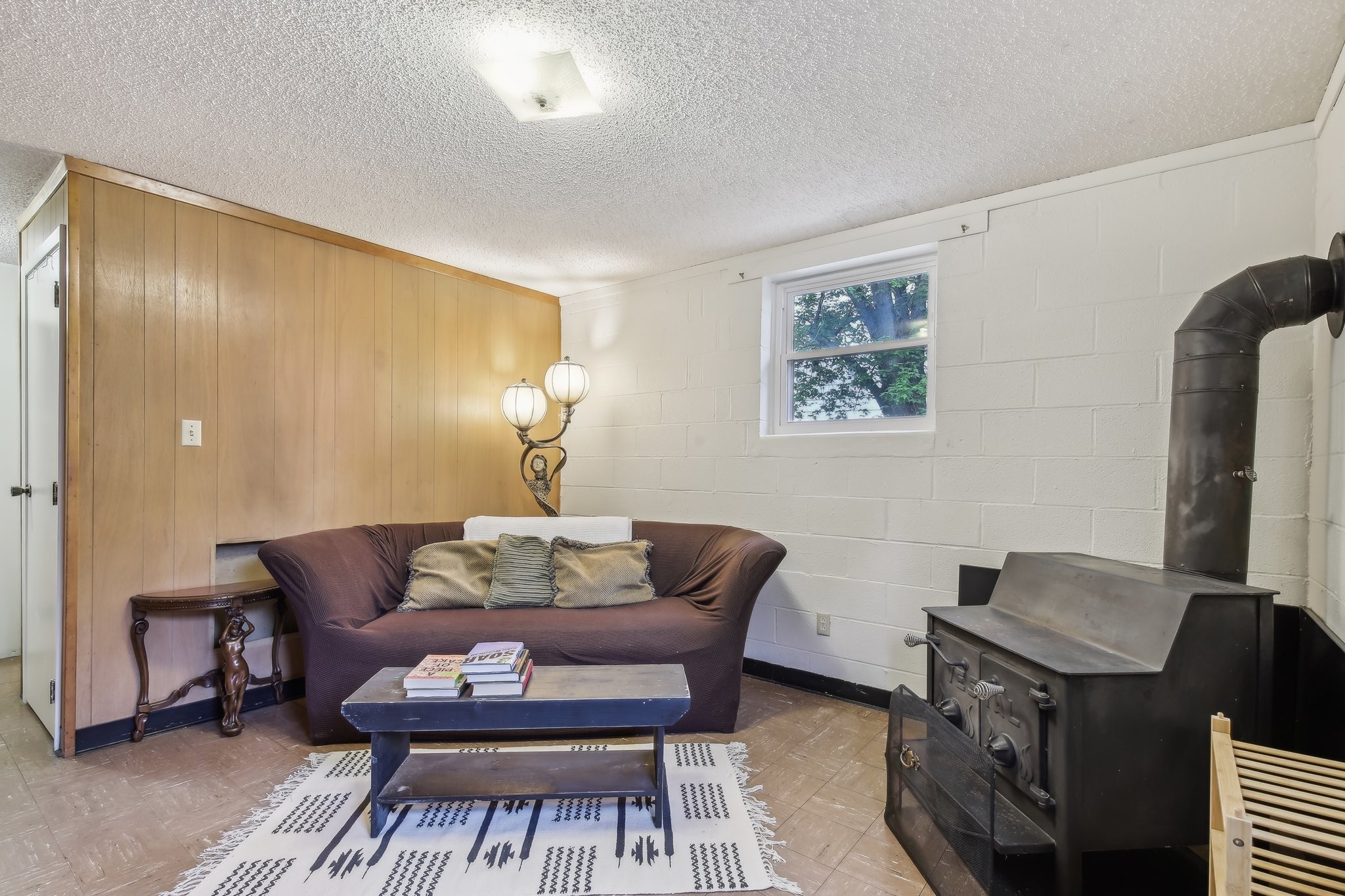 144 Airport Road Clarksville, TN 37042 - Photo 42 of 49 a living room with furniture and a flat screen tv