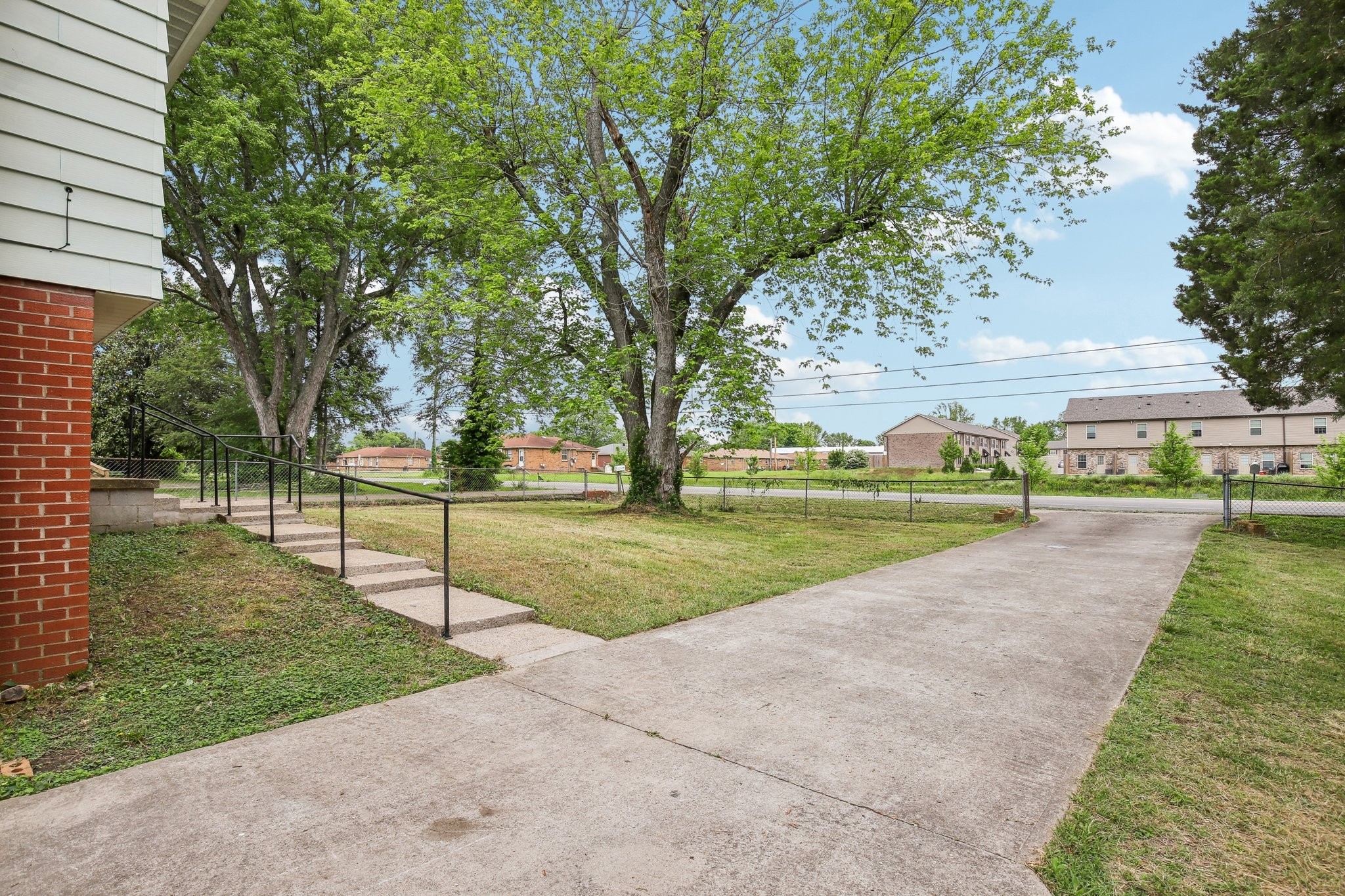 144 Airport Road Clarksville, TN 37042 - Photo 6 of 49 a view of a park with large trees