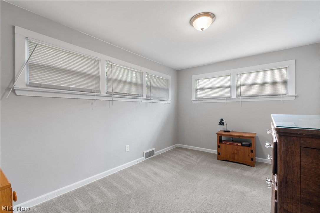 5768 Nolley Road Akron, OH 44319 - Photo 17 of 38 Another bedroom with light carpet