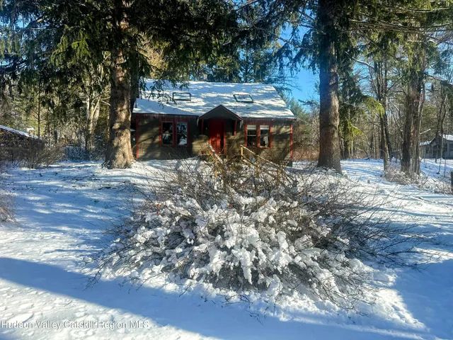 a view of a dinning table and chairs in the forest