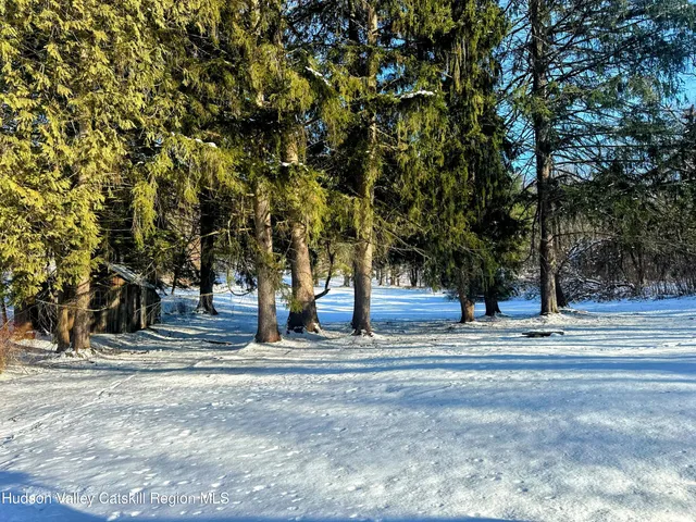 a view of a chairs and tables in the patio