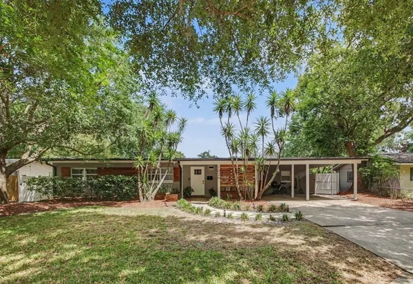 front view of a house with a yard