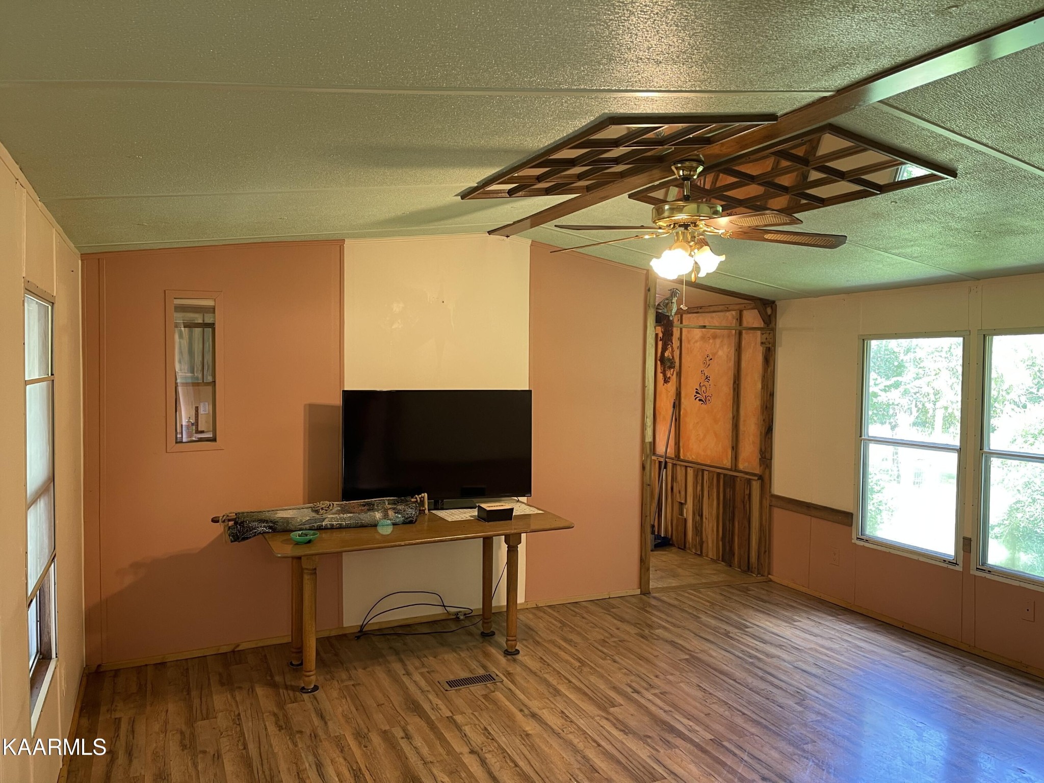 625 Miller Road Bybee, TN 37713 - Photo 11 of 34 a view of a room with wooden floor and windows