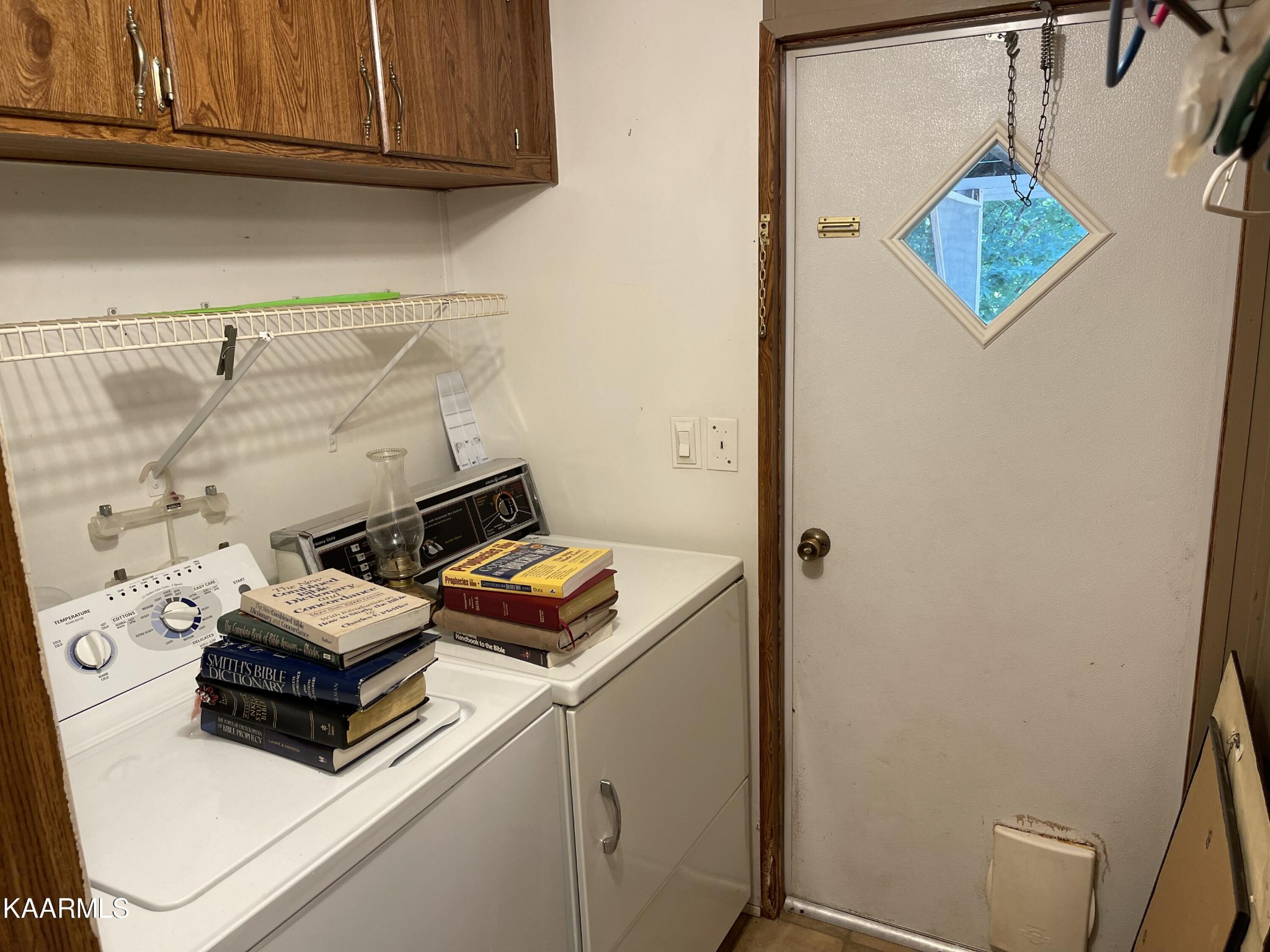625 Miller Road Bybee, TN 37713 - Photo 27 of 34 a view of storage and utility room with washer and dryer