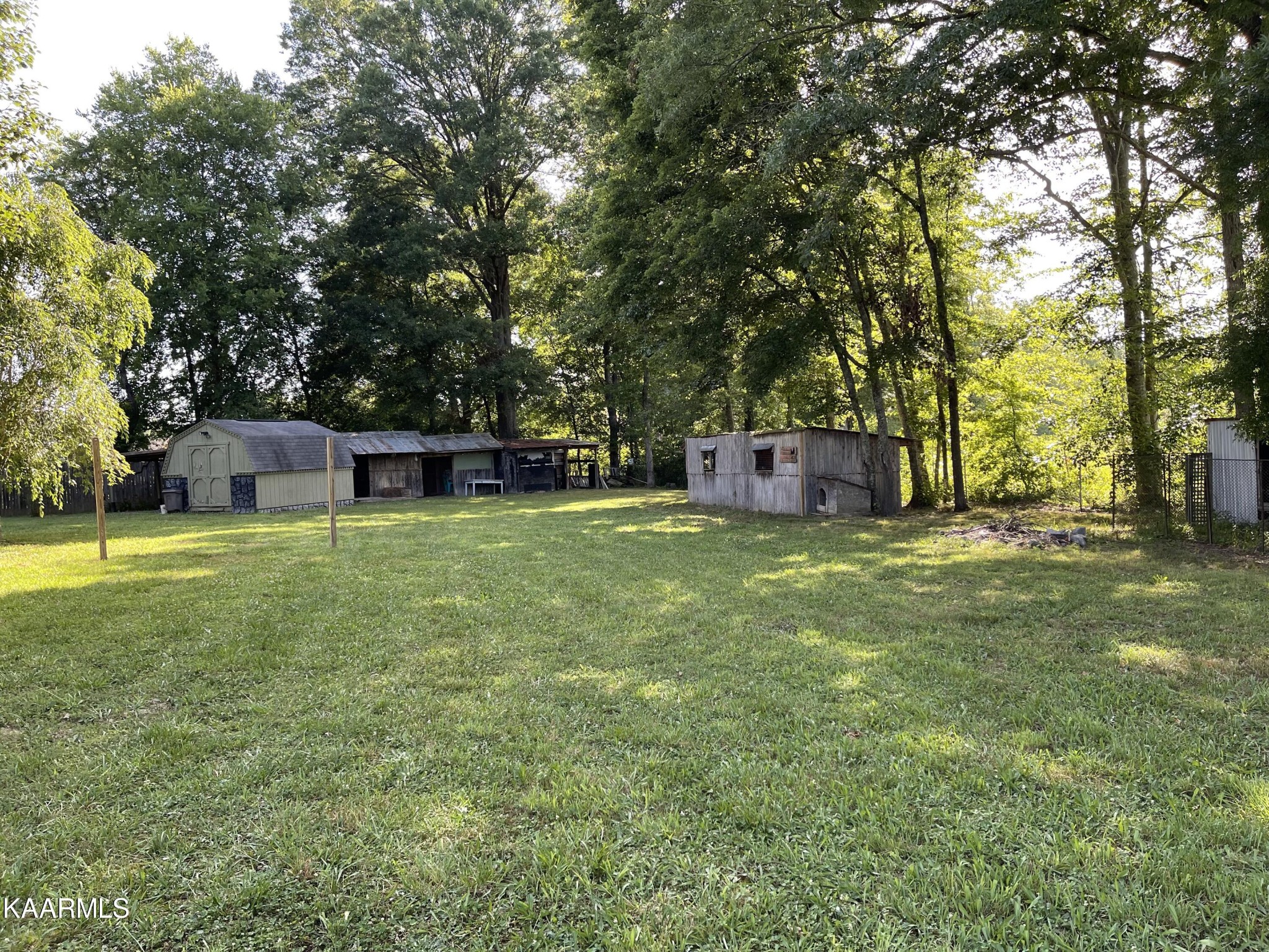 625 Miller Road Bybee, TN 37713 - Photo 28 of 34 a view of a house with a yard