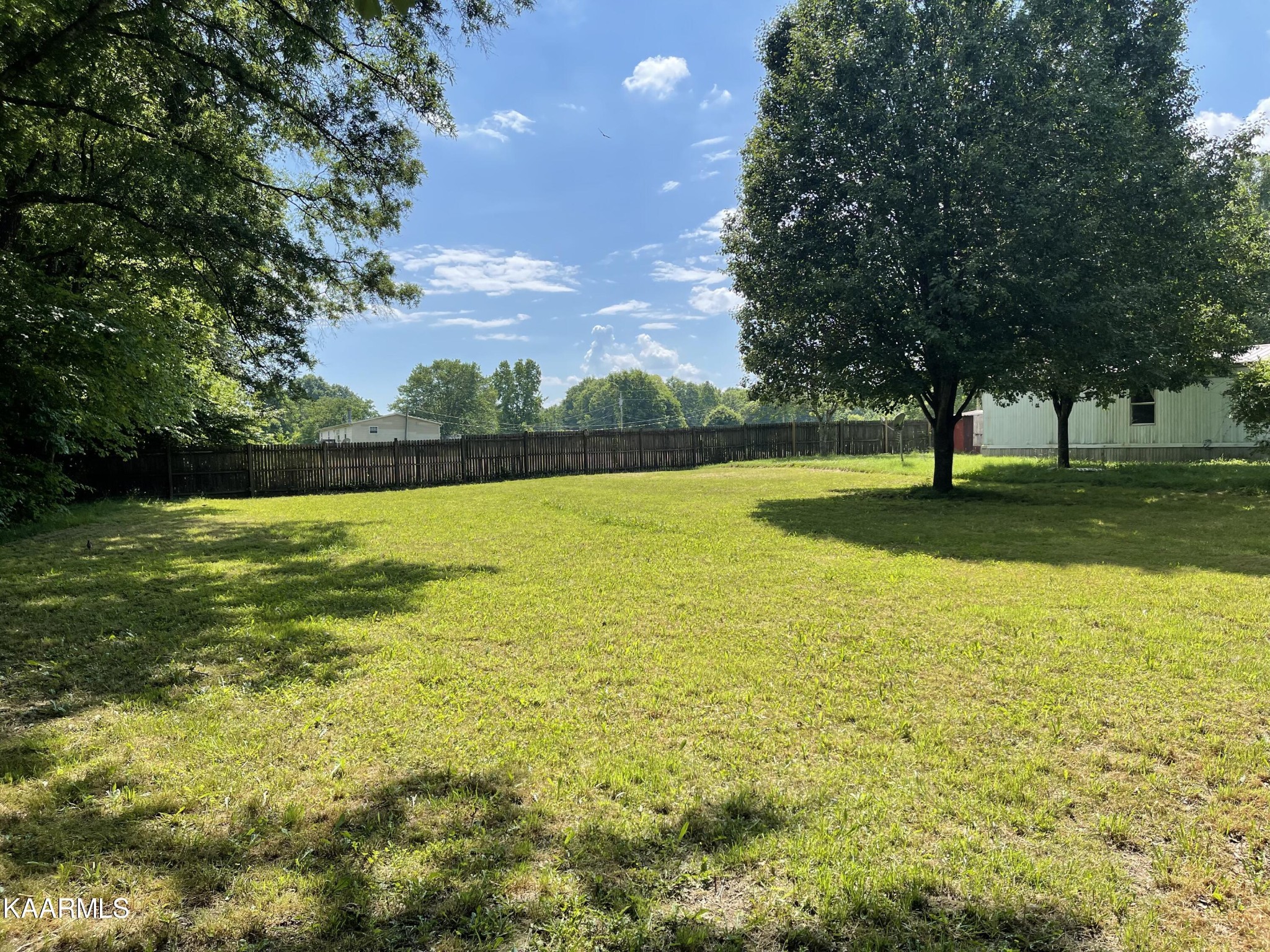 625 Miller Road Bybee, TN 37713 - Photo 7 of 34 a view of an ocean with a swimming pool and trees