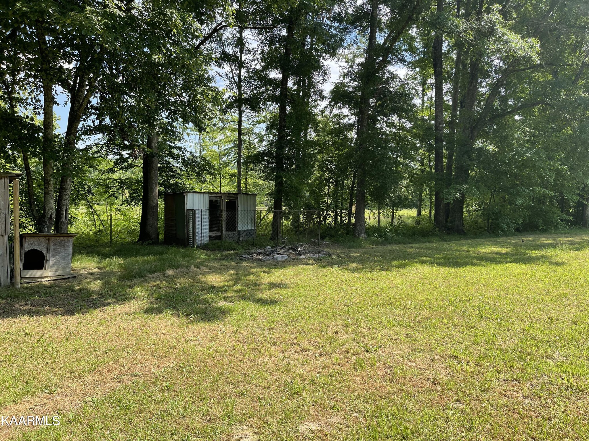 625 Miller Road Bybee, TN 37713 - Photo 10 of 34 a view of a house with swimming pool