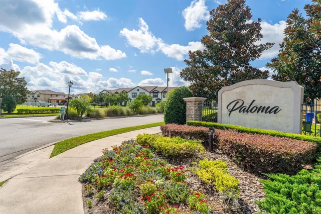 a view of a swimming pool with a lounge chairs