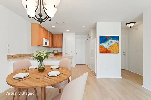 a view of a kitchen with a sink and dishwasher