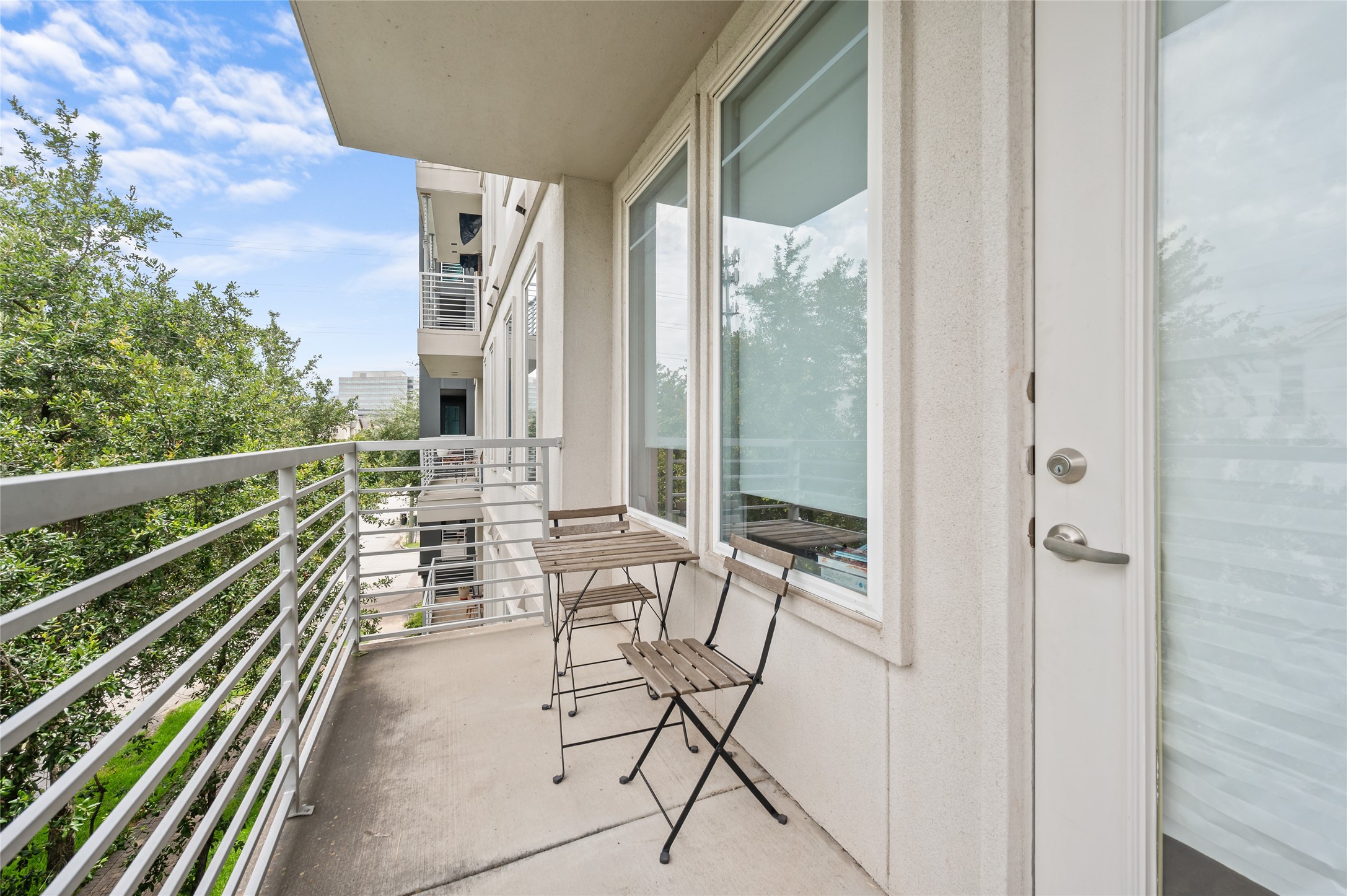 505 Jackson Hill Street, Unit 206 Houston, TX 77007 - Photo 30 of 35 a view of balcony with chairs