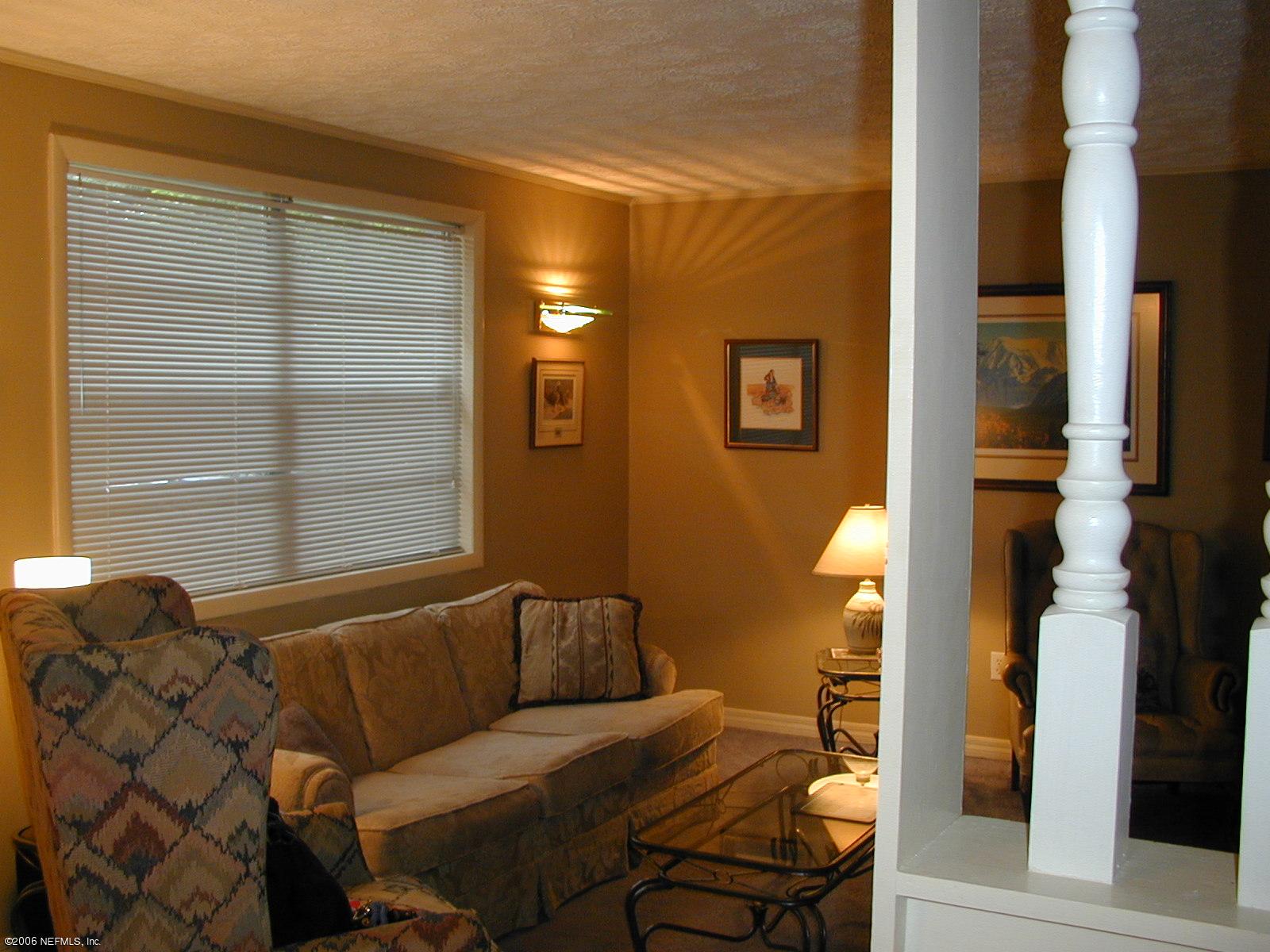 5343 Stetson Road Jacksonville, FL 32207 - Photo 4 of 8 a living room with furniture and a window