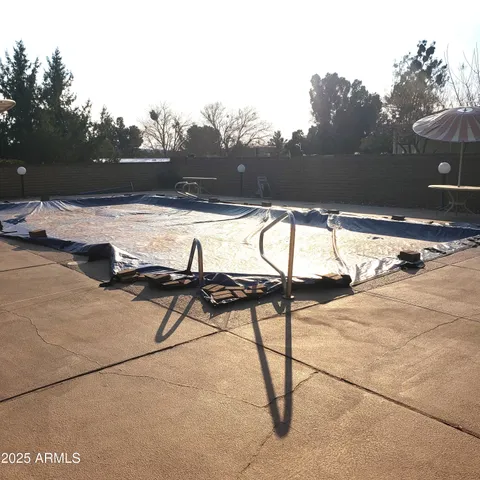 a view of a house with a tree