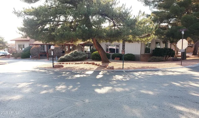 a view of a room with kitchen view and a window