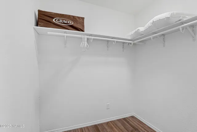 a view of a room with racks on the wall