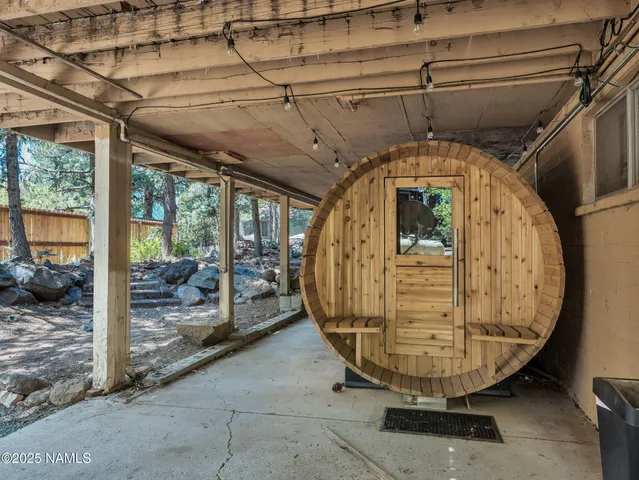 a view of an empty room with sliding door