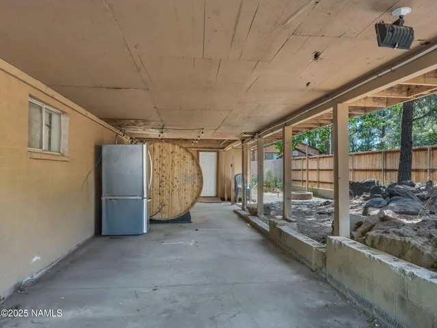 a view of a chairs in the patio