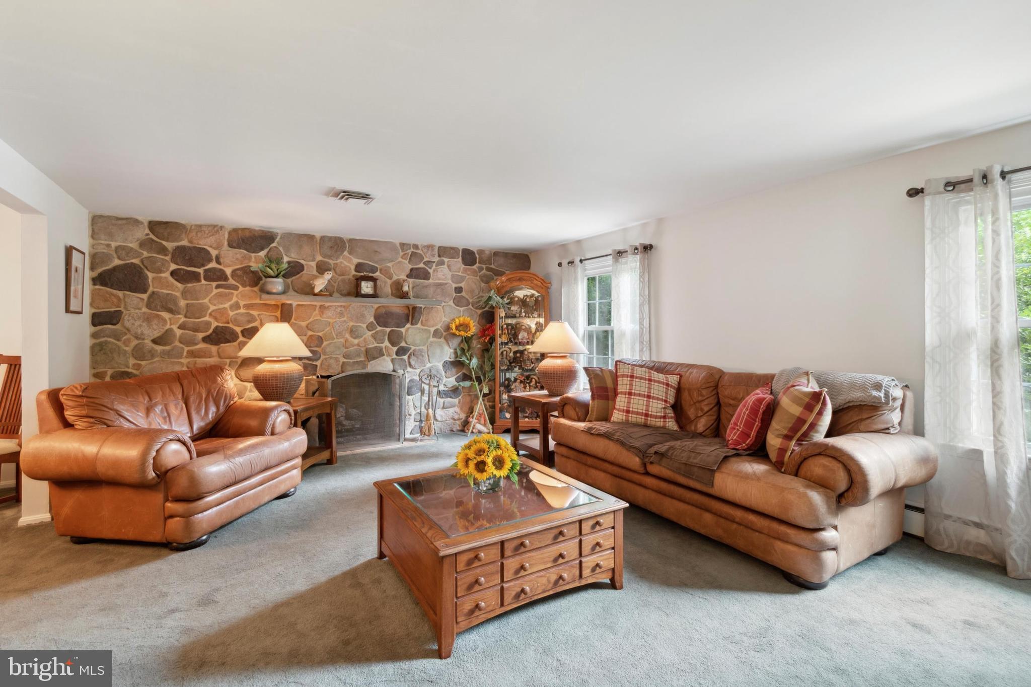 610 Brookhaven Road Wallingford, PA 19086 - Photo 3 of 25 a living room with furniture and a couch