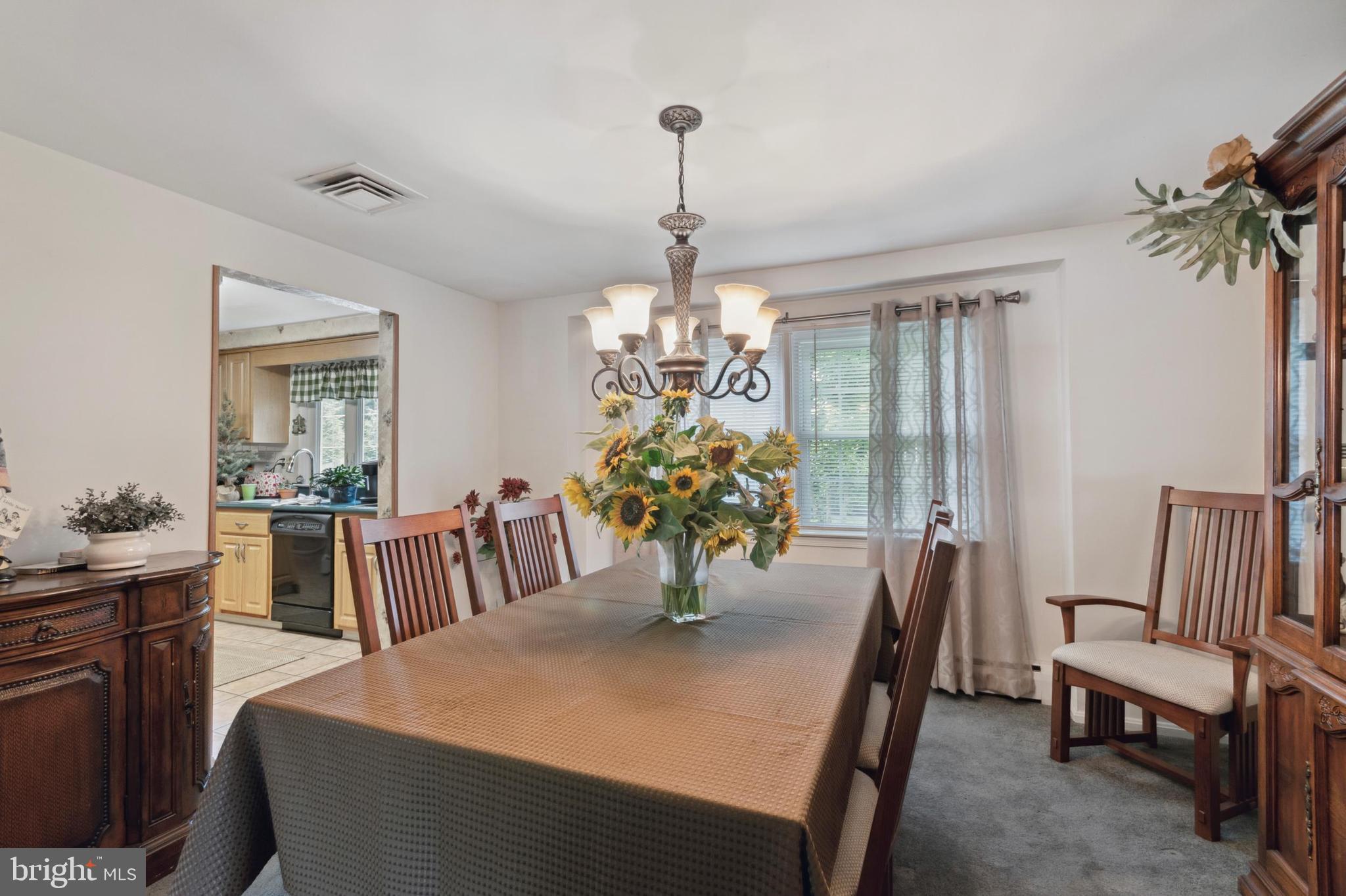 610 Brookhaven Road Wallingford, PA 19086 - Photo 6 of 25 a view of a dining room with furniture window and outside view