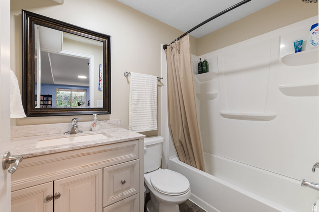 1625 Pages Pl Drive Bountiful, UT 84010 - Photo 29 of 31 Full bath featuring vanity and shower / bath combination with curtain